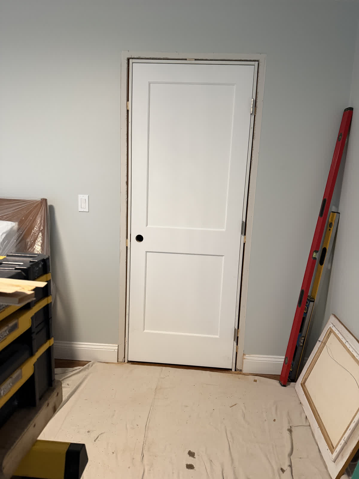 Interior door installation in progress