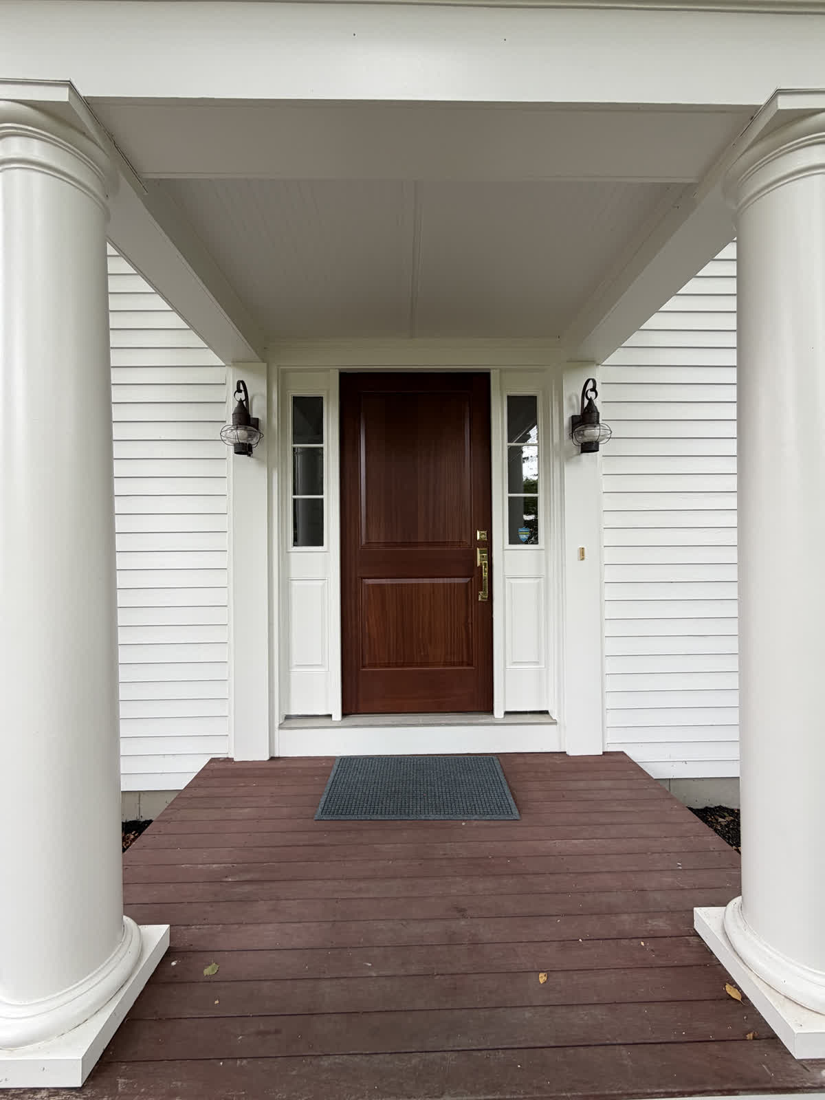 Finished front entry door with sidelights